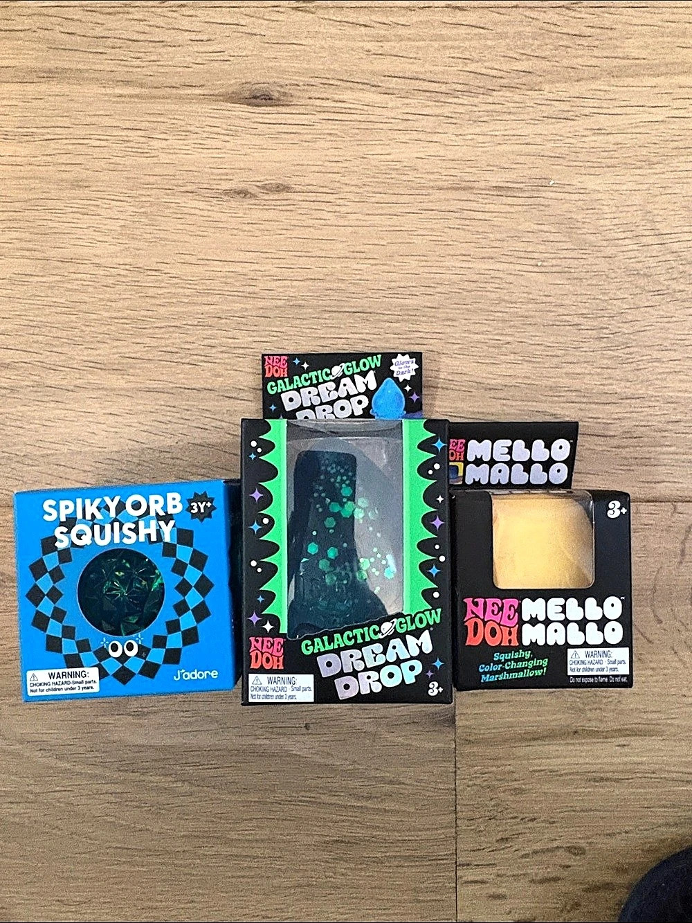 NeeDoh Galactic Glow Dream Drop, NeeDoh Mello Mallo, and SpikyOrb 3+ Squishy